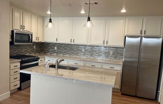 A BEAUTY!  2 STORY 3 BR/2.5 BATH HOUSE IN HIGHLY DESIRABLE GATED COMMUNITY