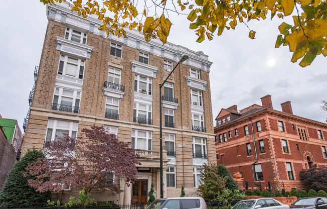 exterior of brick apartment building at dupont apartments in washington dc