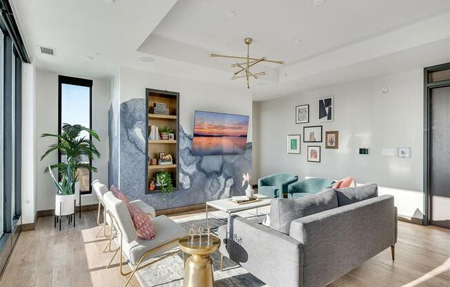 Living room with natural light and a couch