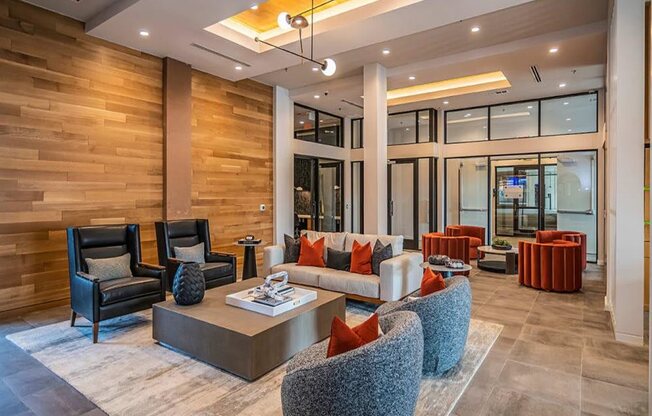 a living room filled with furniture and a large window