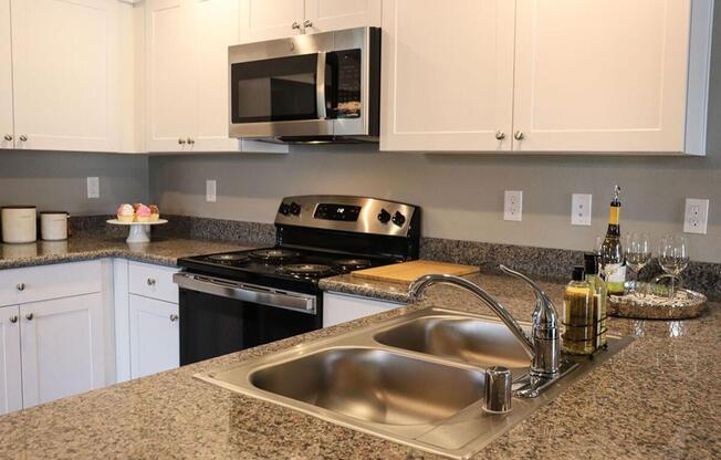 a kitchen with stainless steel appliances