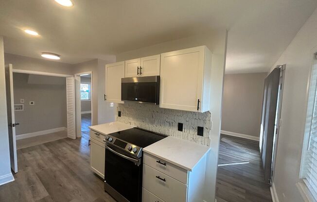 This fully renovated & updated 3 Bedroom and 2.5 Bath is Move-in Ready!
