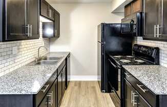 Beautiful newly-renovated one, two and three bedroom apartment townhomes with high-end finishes at Highpoint Apartments in Omaha, NE