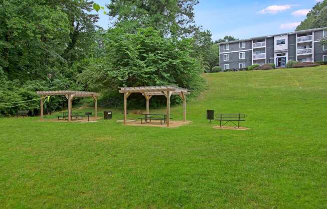 Picnic area and grill station at Lacota Apartments in Atlanta, GA 30360