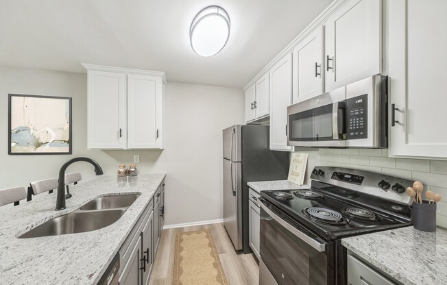 Elevate your lifestyle at Eagle Rock Apartments at Columbia. Enjoy modern kitchens equipped with stainless steel appliances and elegant finishes. Find your perfect home today and enjoy a vibrant community atmosphere. Schedule a tour now!