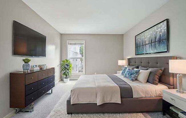 Bedroom With TV at Glen at Lakewood, Colorado