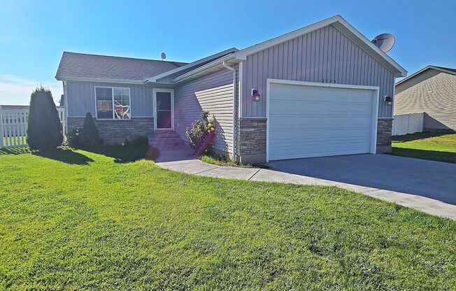 Beautiful & Bright 3 bed, 2 bath Home for Rent in Idaho Falls!  2 Car Garage & Fenced Yard by Real Property Management