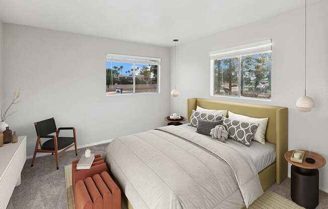 Model Bedroom with Carpet and Window View at Tanque Verde Apartments located in Tucson, AZ.