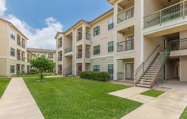 a large lawn in front of a building