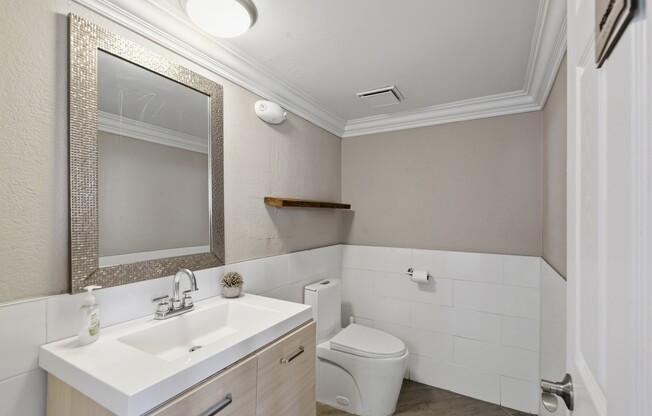 Elevate your living experience at Wymore 360 Apartments. This modern bathroom features sleek finishes and a spacious layout, perfect for your comfort. Don't wait—schedule a tour today and see the difference for yourself!