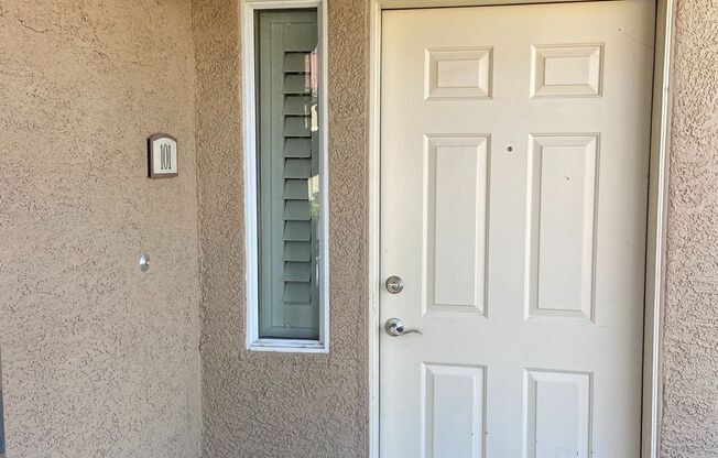 BEAUTIFUL CONDO IN A GATED COMMUNITY FEATURING PLANTATION SHUTTERS, TILE FLOORING AND NEW PAINT THROUGHOUT!