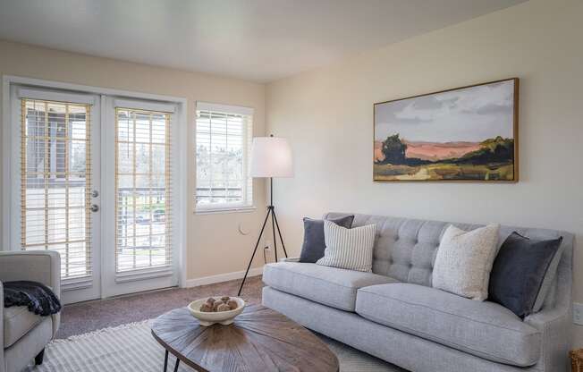 a living room with a couch and a coffee table