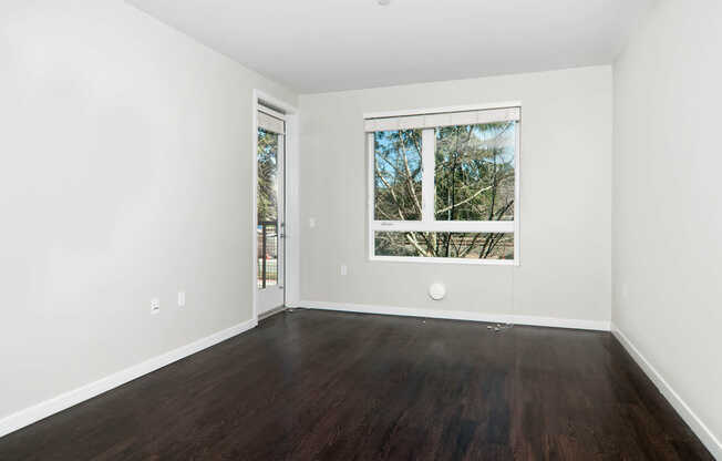 Living Room with Balcony and Hard Surface Flooring