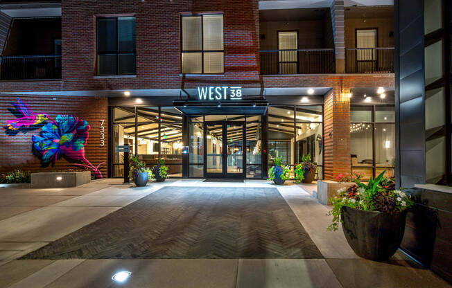 West 38 Apartments Exterior Entrance at Night