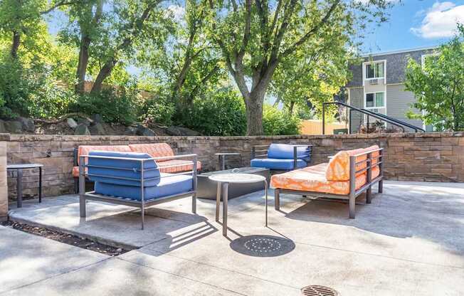 A patio with a table and two chairs.