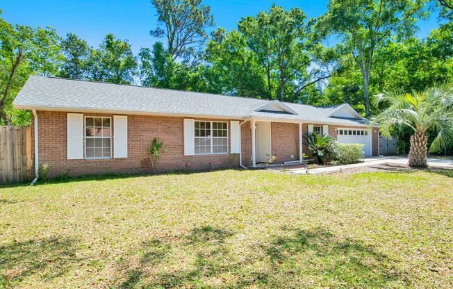 Well-Maintained Home with 2-Car Garage & Screened Back Porch in Central Location