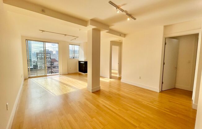 Top Floor 2 bed / 2 bath, city views from private balcony, Garage, In Unit Laundry, Centrally Located Condo, Pet ok - PROGRESSIVE
