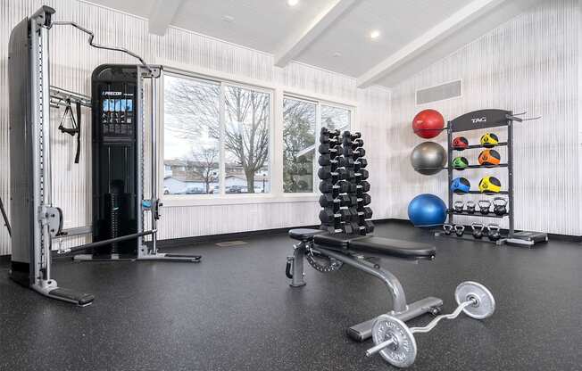 fitness center with weight lifting equipment