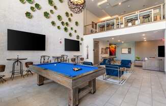 play a game of pool in our game room at our apartments