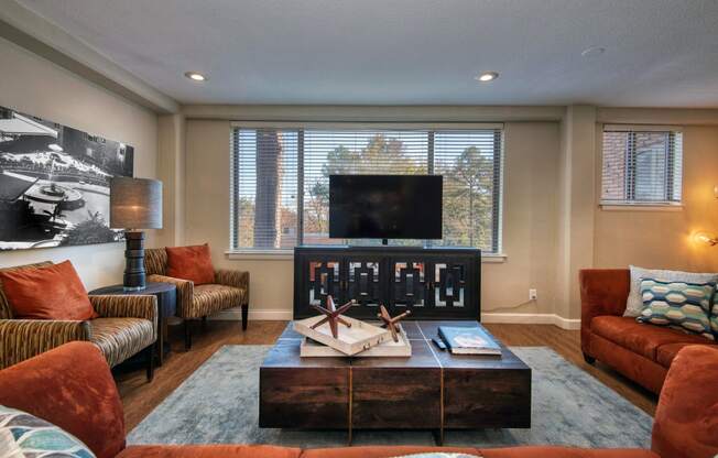 a living room with couches and a coffee table