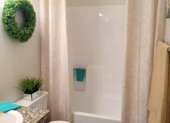 Bathroom With Bathtub at Citrus Gardens Apartments, Fontana, CA 92335
