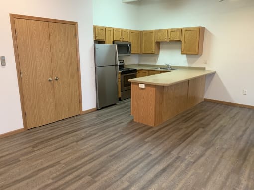 Wood Floor Dining Room at Warehouse Apartments, North Dakota