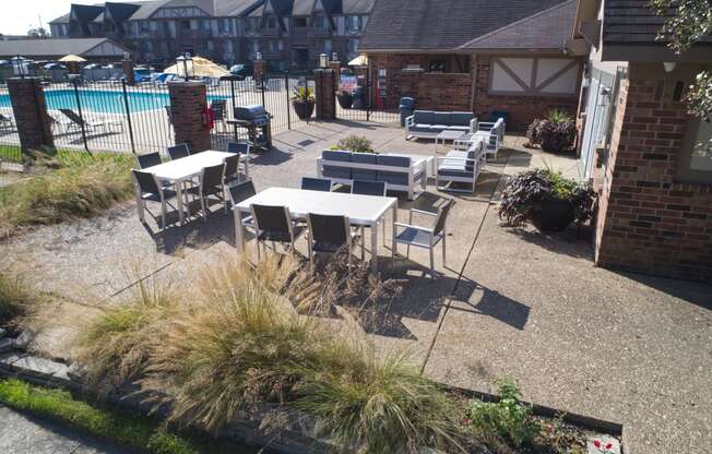 Poolside Patio Seating at The Timbers Apartments, Evansville, IN