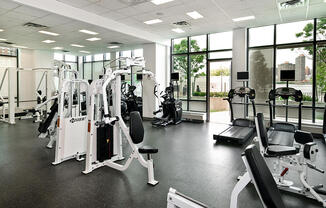 Resident Gym at 4720 Center Blvd includes weights, cardio, and other machines for residents. 