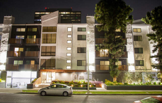 Exterior night view of building at Westwood Riviera Apartments, Los Angeles, 90024