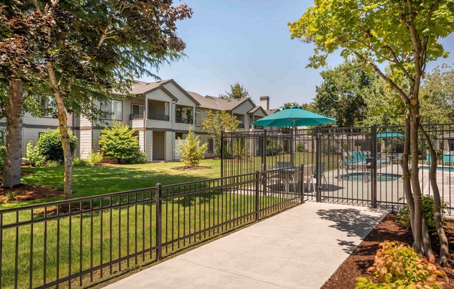 Outdoor Pathway with Pool View at Swimming pool and spa at Forest Hills in Eugene, Oregon