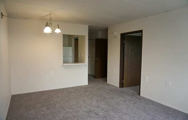 Living Room and bedroom door, at Highland Towers in Southfield