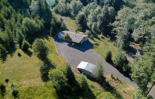 Don't miss this rare country property with shop and acreage!!
