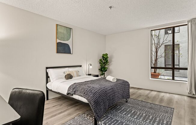 A 3 Bedroom apartment with Private & Common Bathrooms, common areas and a fully functional kitchen at 655 Kelton Ave.