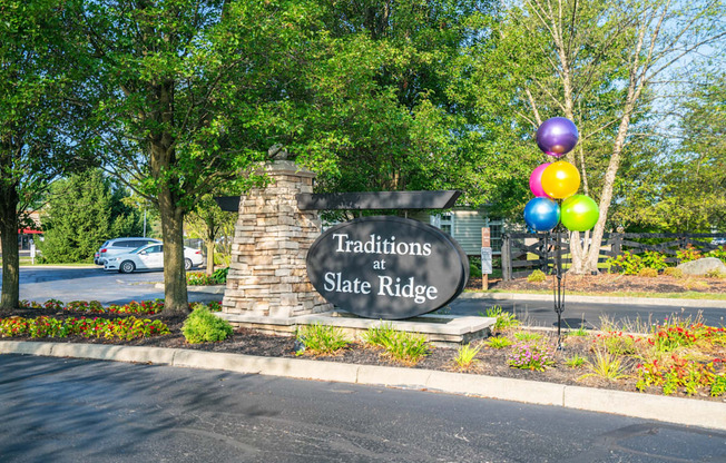 the sign for traditions at state at the entrance to the park