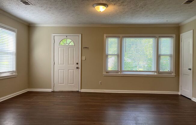 Great location! 2 bedroom 1 bath with a bonus/3rd Bedroom. Wonderful corner lot.