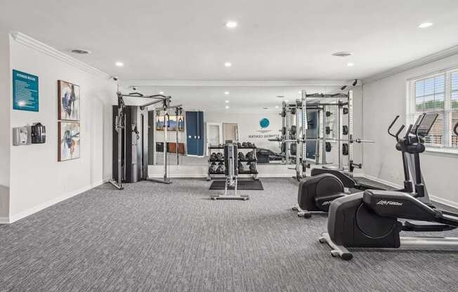 24-hour fitness center with cardio machines and free weights at Hendersonville TN apartments