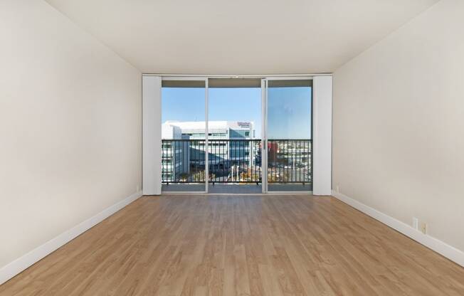 seaport unfurnished living room with wood plank style flooring at Avenue Two Apartments, Redwood City  , CA