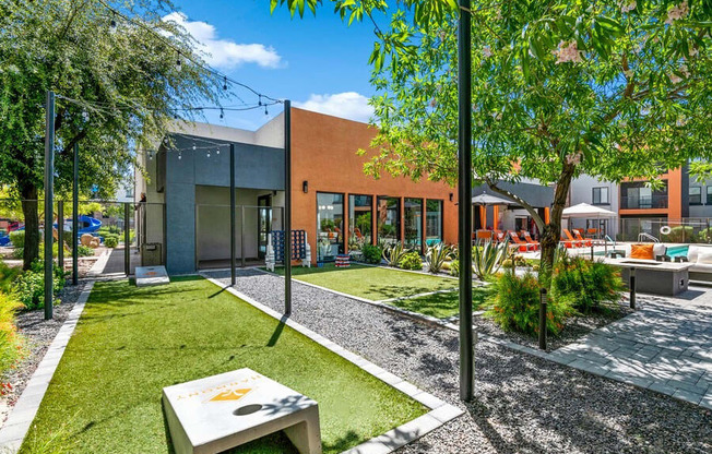 Outdoor Corn Hole Area at Harmony at Surprise Apartments in Surprise, AZ.