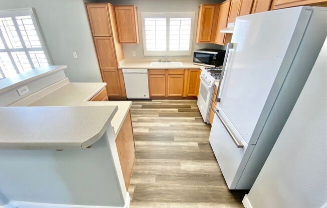 STUNNING 3 BEDROOM 2 BATH SECOND FLOOR CONDO IN GATED COMMUNITY