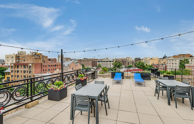 Rooftop deck with tables and seating at 1633 Q, Washington, DC, 20009