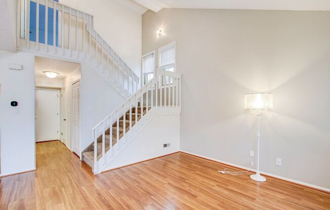 Impeccably Maintained End Unit Townhome with 2-Car Garage: Effortless Comfort & Convenience Await!