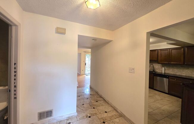Amenities abound: spacious townhouse with "main & junior suite bedrooms", garage, full basement, backyard AND pet friendly!