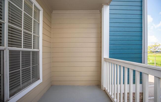 a bench in front of a window