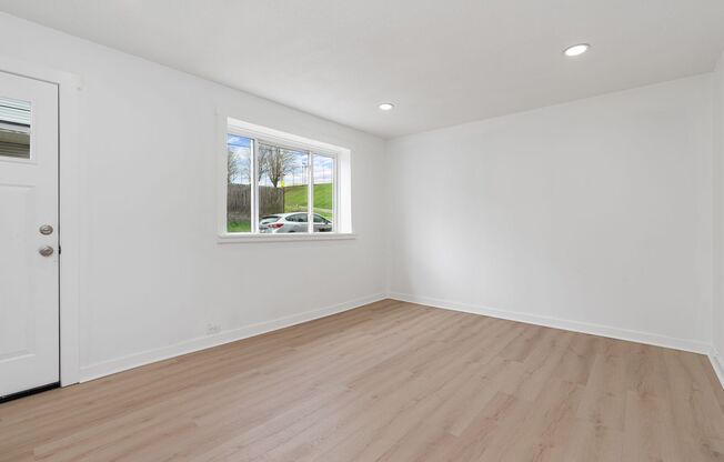 Newly Renovated 4 Bed, 2 Bed Home - Off-Street Parking, 3rd Floor Primary Suite - Available Now!
