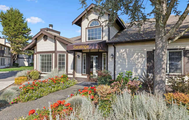 A Saratoga sign is on the front of a building.