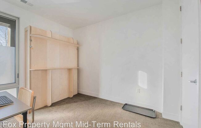 1125 W 37th Ave
