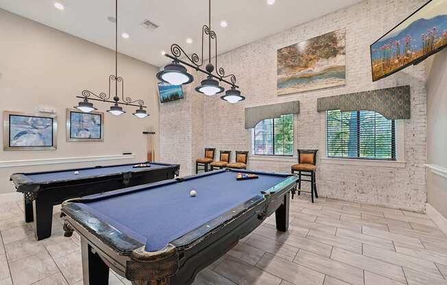 the preserve at ballantyne commons game room with two pool tables