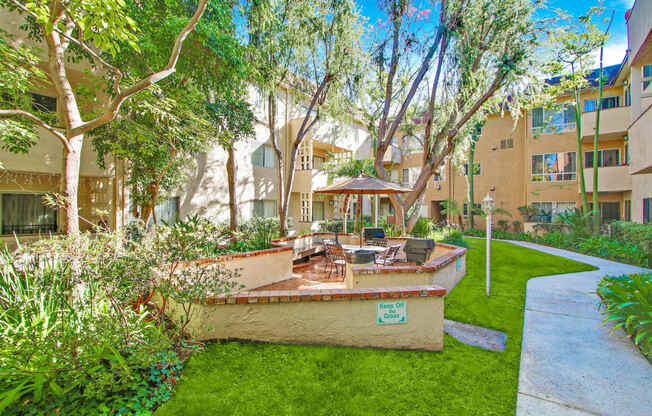 Resort-like picnic and barbecue area, lush landscaping