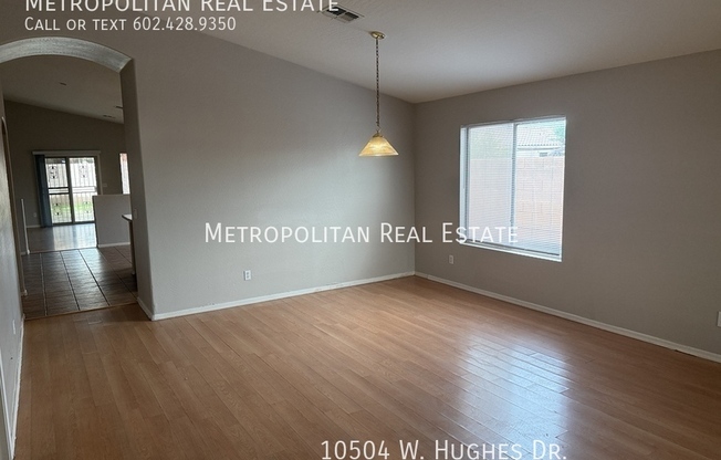 10504 W HUGHES DR