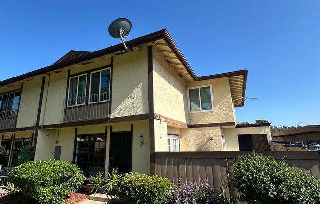 Spacious 3BR/2.5BA updated 2-story townhouse for rent with fenced patio, 2 parking spaces and more